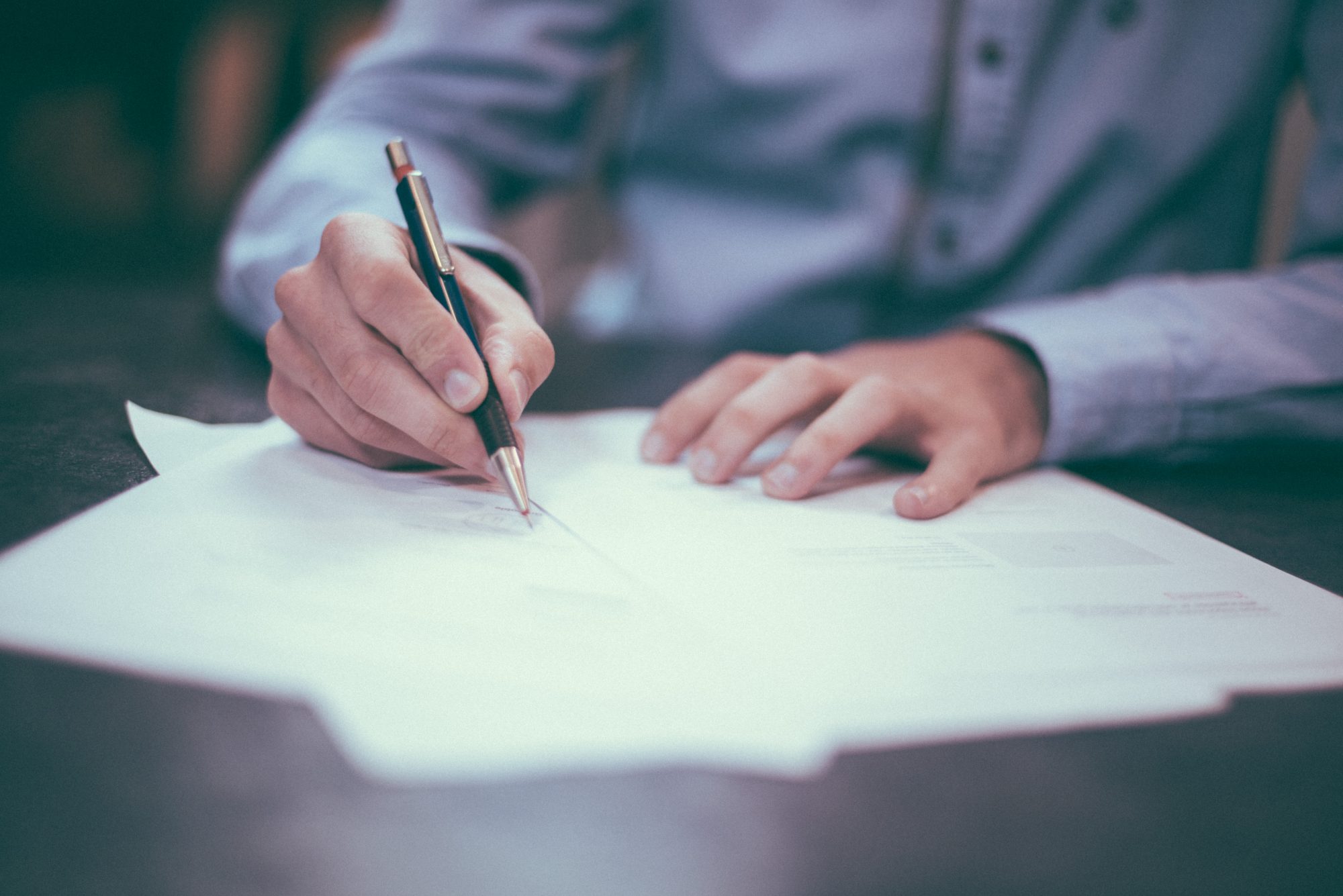 person signing a document containing a deed of release