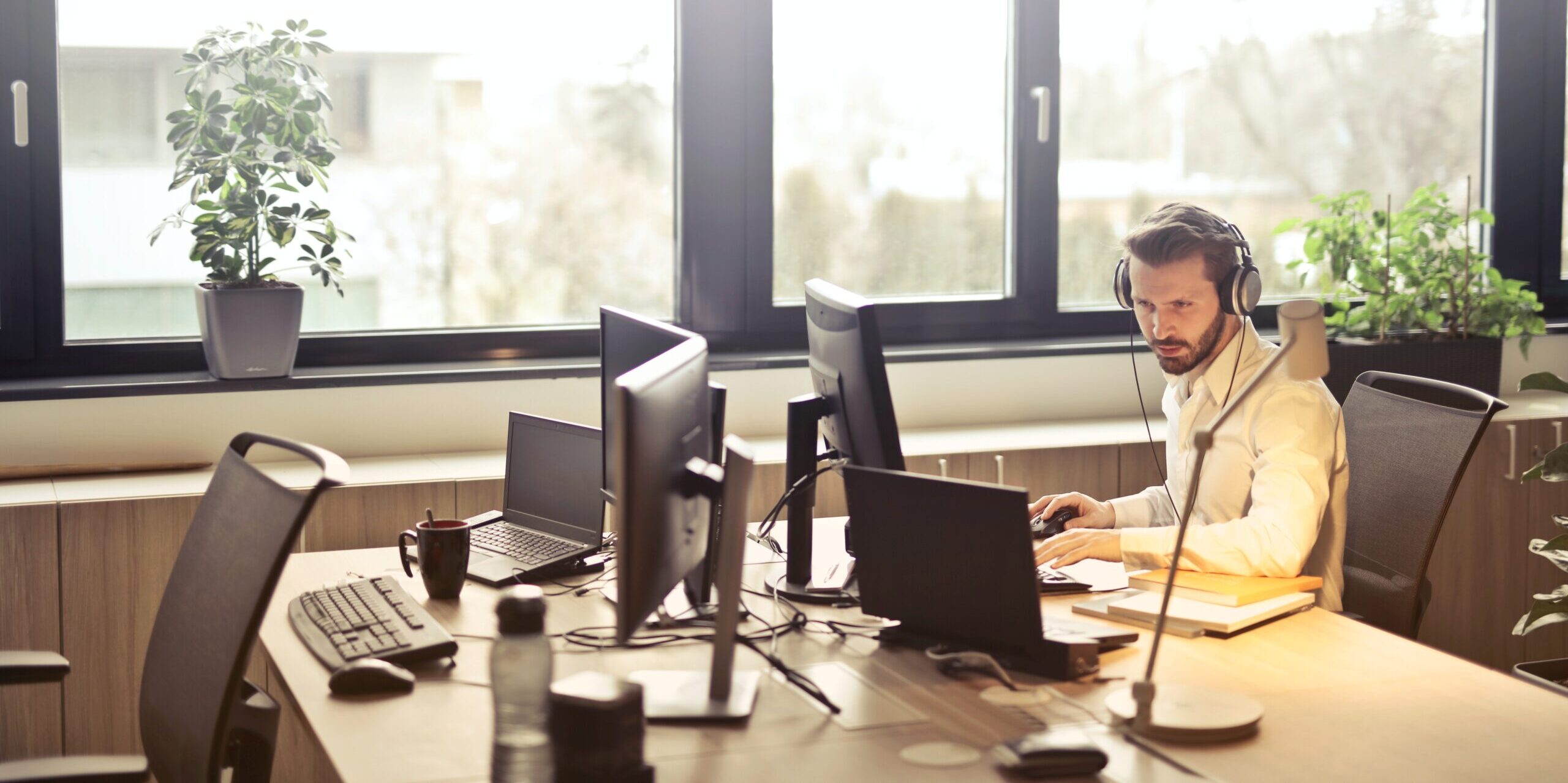 Man working in an open plan office on a public holiday