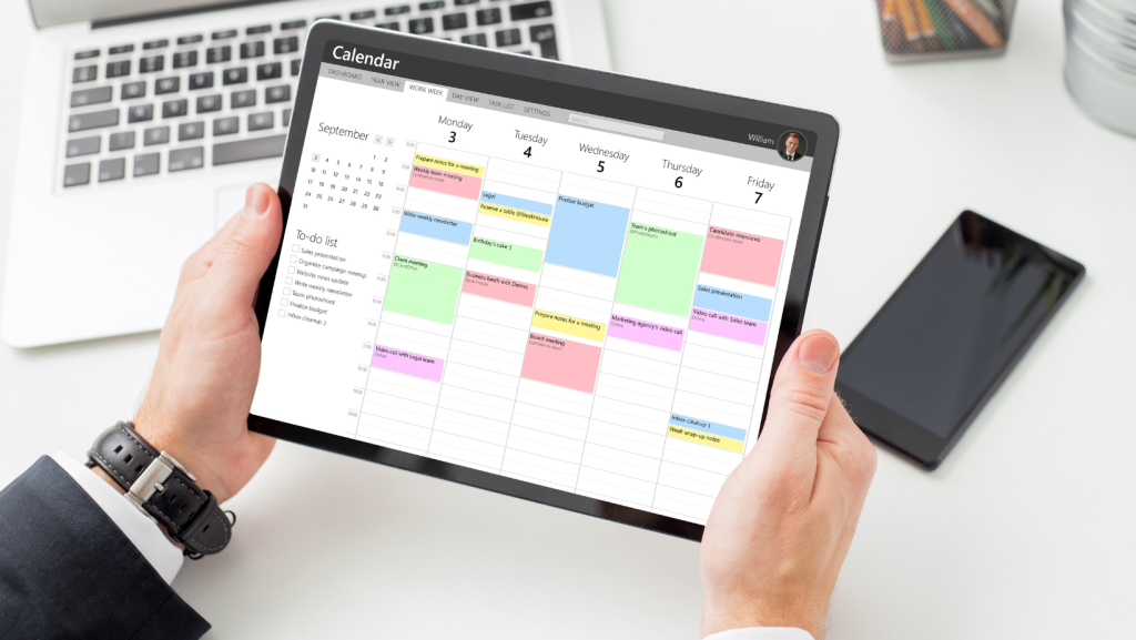 Tablet with calendar app open showing working hours schedule