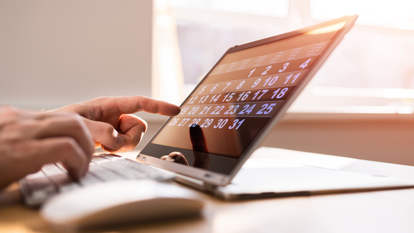 hands on laptop selecting a public holiday substitution date on digital calendar